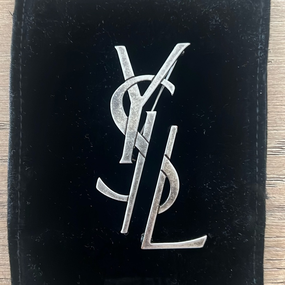 Silver YSL brooch